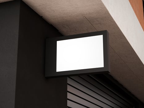 Blank logo sign board on a shop wall photo