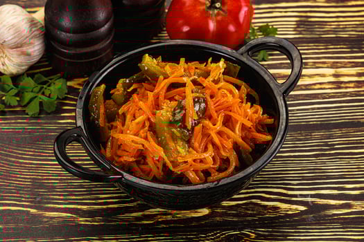 Salad with korean carrot and cucumber photo