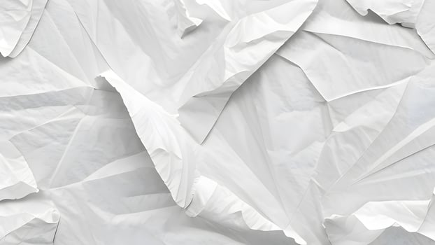 crumpled paper texture in grayscale photo