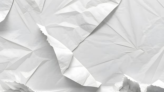 crumpled paper texture in grayscale photo