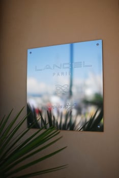Lancel Paris sign exudes prestige and sophistication in modern urban setting photo
