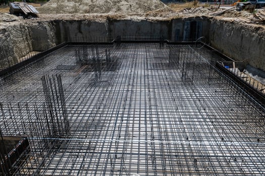 Foundation of a new house with reinforced concrete. Urban construction buildings foundation. photo
