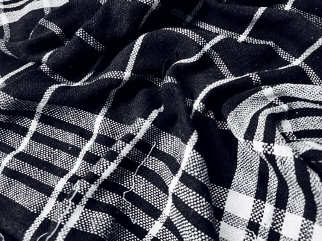 Black fabric background and pattern with white stripes photo