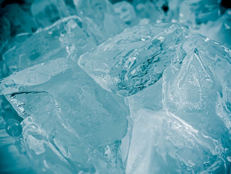 icecubes background,icecubes texture,icecubes wallpaper,ice helps to feel refreshed and cool water from the icecubes helps the water refresh your life and feel good.ice drinks for refreshment business photo