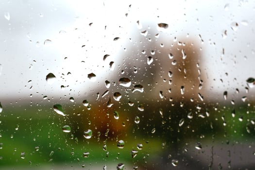 Drops on a window with a beautiful background photo