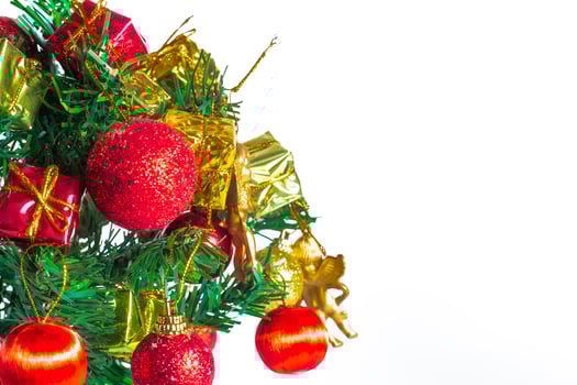 A christmas tree with ornaments and presents photo