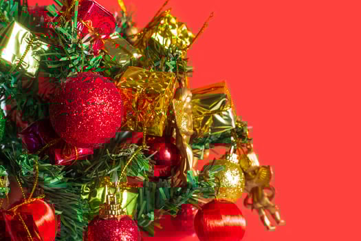 Christmas decorations on a red background photo
