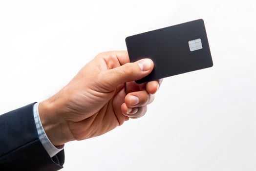 Blank black credit card isolated on white background, photo studio hand hold blank credit card
