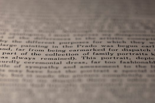 macro photography of a book page with text in English font photo