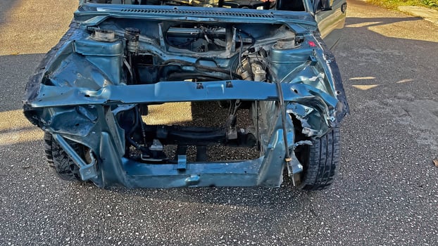 Crashed car in the garage. photo