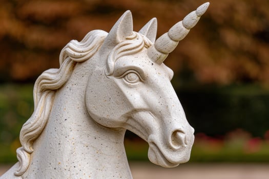 Ornamental unicorn statue in a garden photo