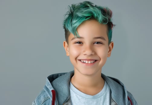 Smiling boy with vibrant green hair photo