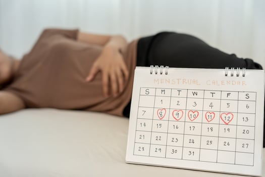 stomach ache. Asian women have abdominal pain, indigestion, gastritis, menstrual cramps, flatulence, diarrhea, distention, colon cancer, belly inflammation problem, suffer food poisoning, abdomen photo