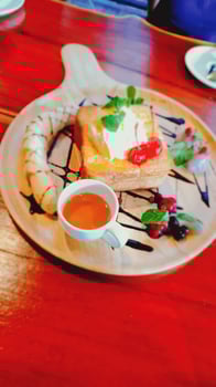 Delicious dessert creation cozy cafe food photography warm ambiance close-up view culinary delight photo