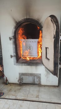 Cremation at a thai temple spiritual ritual cultural heritage fire ceremony serene environment observational viewpoint photo