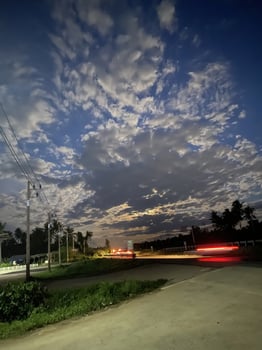 Evening sky transformation rural road nature photography serene environment aerial view tranquility and change photo