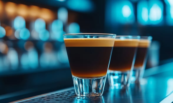 Cold Brew Martinis at the bar, close up vibrant blues and rich caramel hues highlighted photo