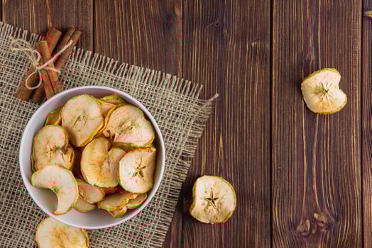 Dried sliced apples in a white bowl photo