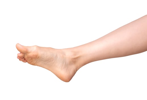 Foot care model, young woman barefoot, isolated view. Smooth skin, soft sole, pedicure, and neat photo