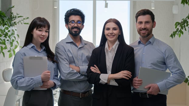 Happy team group business people diverse office coworkers looking at camera smiling posing together crossed hands for corporate portrait leadership successful professional businessmen businesswomen photo