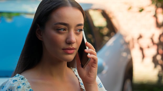 Close up stressed worried nervous Caucasian woman female girl client buyer driver talking mobile phone call service gesturing discussing broken car automobile problem rent auto transport outside city photo