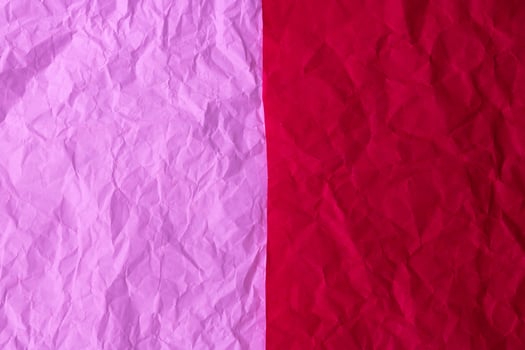 The texture of the background is made of crumpled red and pink paper photo