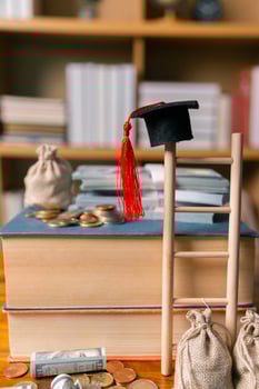 Saving money and investing in education abroad can lead to future success despite the expense, paving way for valuable learning and financial growth. motivation, strategy, analysis, ambition, advice photo