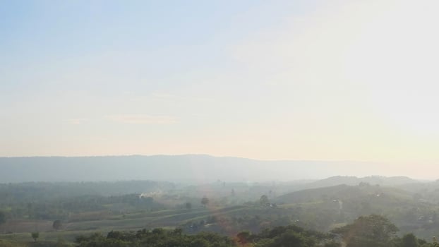 Hill and mountain with blue sky and sunrise time photo
