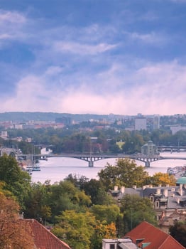 Beautiful city view with river and bridge in daytime photo