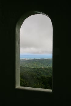 Mountain and sea view from frame of window photo