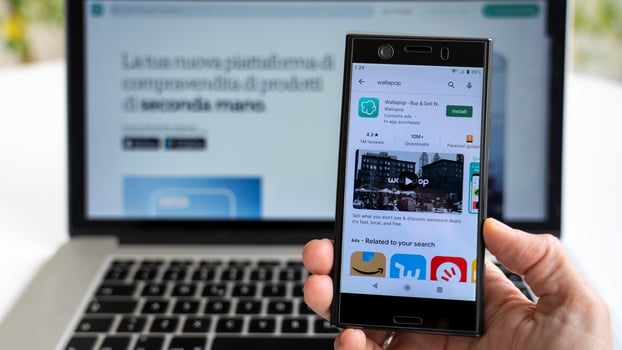 Milan, Italy 11 16 2021 Installing Wallapop app for smartphone. photo