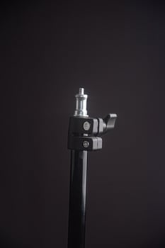Lighting affordable photography stand product isolated on black background photo