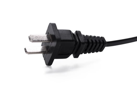 black electric plug cable isolated on white background photo