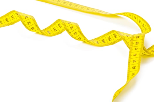 yellow metric measuring tape isolated on white panorama background photo
