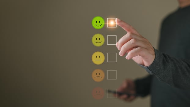 a businessman choose the virtual screen on the happy smile face icon to give satisfaction in service.rating very impressed.customer review service and Satisfaction concept photo