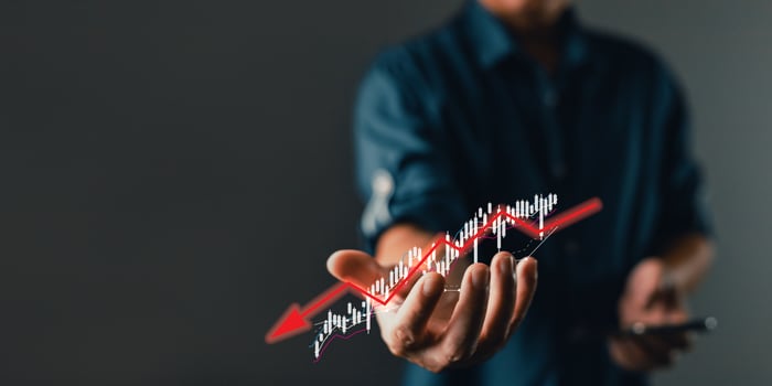 Businessman failure in the hands of businessmen. the graph downtrend, bear stock market, economic crisis, or recession. photo