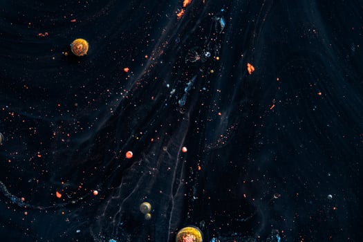 Paint in water. Amazing macro photography in the form of space and planets. photo