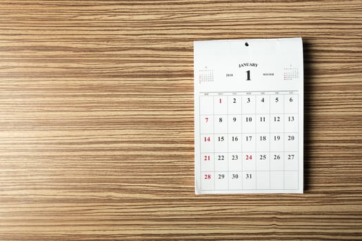 calendar on wooden table photo