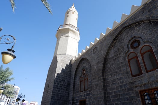 Ghamamah mosque minaret seen from below photo
