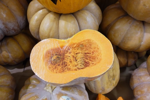An Appealing Freshly Cut Pumpkin Display at a Local Farmers Market This Autumn Season photo