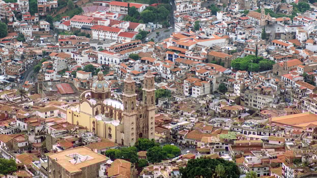 Colorful rooftops and historic architecture of Taxco, Mexico, highlighting cultural richness photo