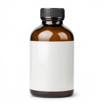 An empty brown glass bottle with a black cap and blank label. isolated on white background. photo