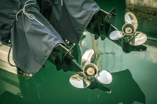 two boat engine with propeller details shot photo