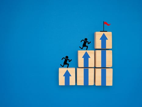 Common goal success concept. Teamwork rises to target and achieves a successful business photo