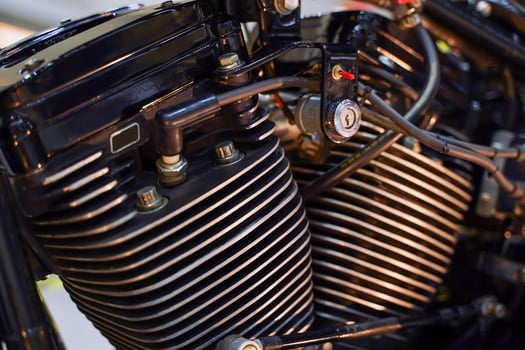 Closeup and perspective view twins engine of classic Chopper and cruise motorbike in black colors photo