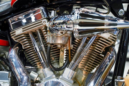 Closeup and crop engine of Chopper motorbike and air intake in arrow design with chrome colors photo