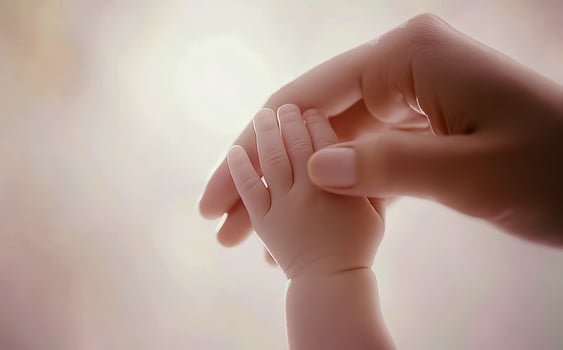 Close-up little hand of child baby holding hand of mother, A newborn holds on to mom's, dad's finger, Love and relationship with infant, Care and support, Dreaming and protection. photo