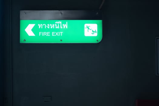 Emergency exit sign on the platform of the railway repair station. photo