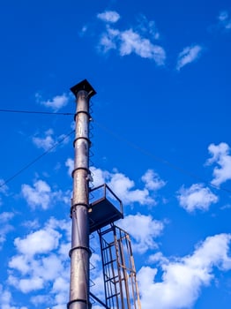 A smokestack of an incinerator photo