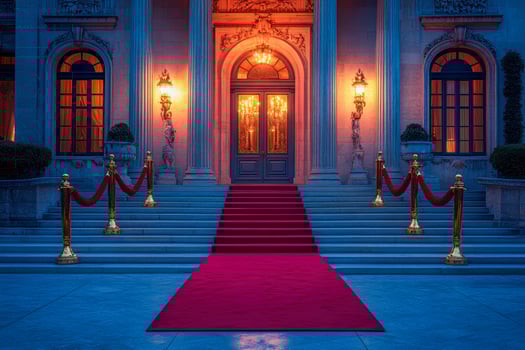 Elegant red carpet entrance at dusk photo